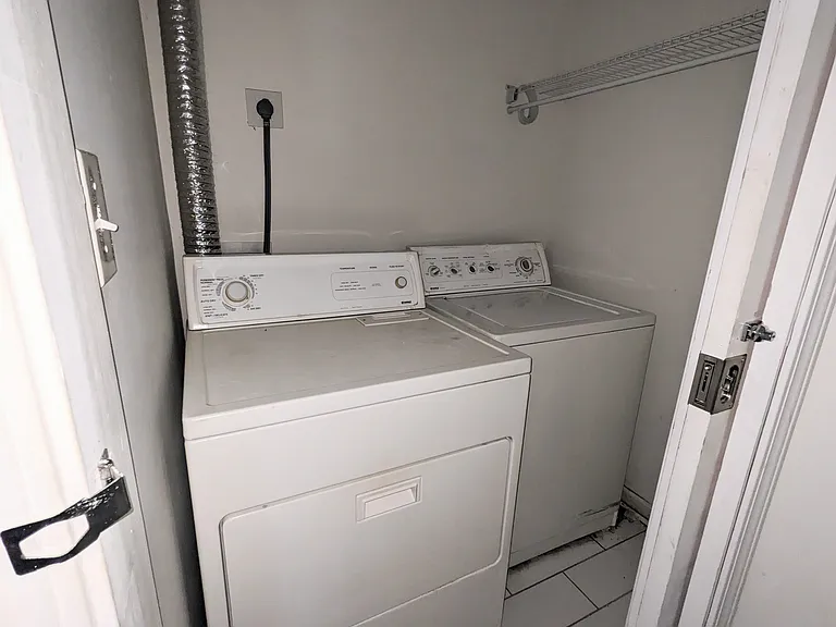 Laundry room w/ Washer & Dryer included.