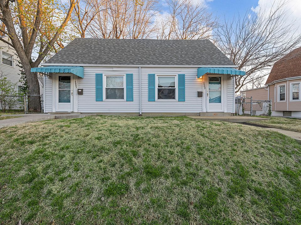 Exterior of duplex. 
5903 on right side.