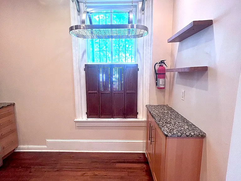 Kitchen, ceiling rack above island, with side cabinet