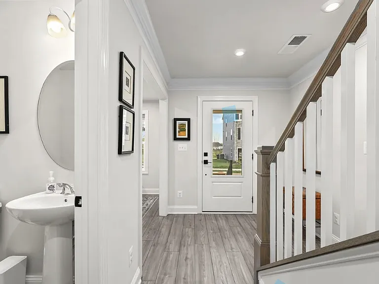 Entry and half-bath on first floor w plank-flooring