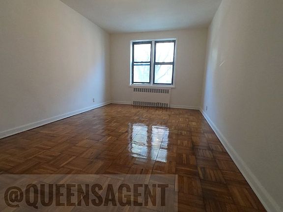 5th image of 66-20 Wetherole St #D1