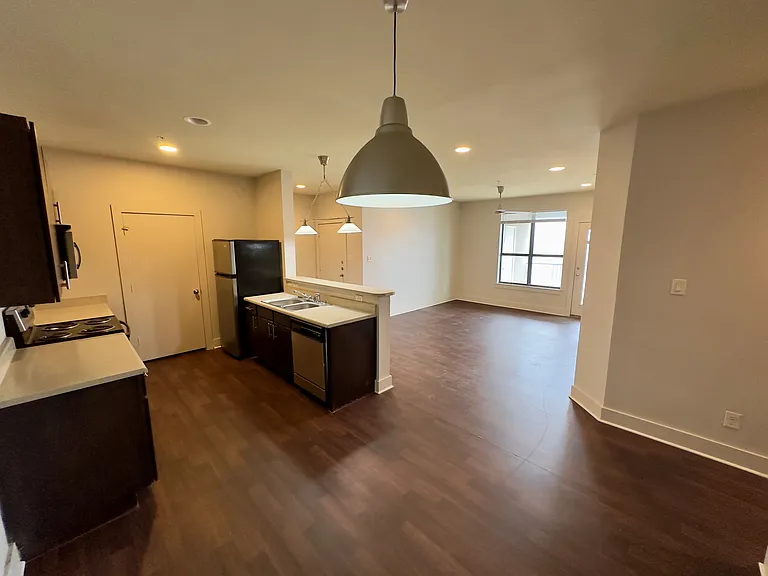 Spacious Kitchen and dining area with kitchen bar; ideal for entertaining.