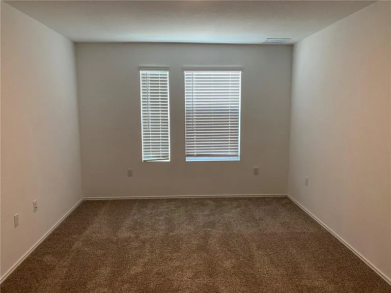 7204 Dancing Wind Ln — Photo 24