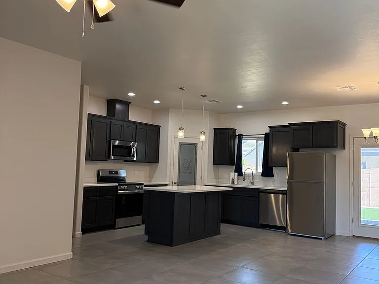 12682 E 50th Ln — Photo 2