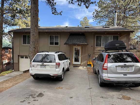 Front main entrance of the property facing West.