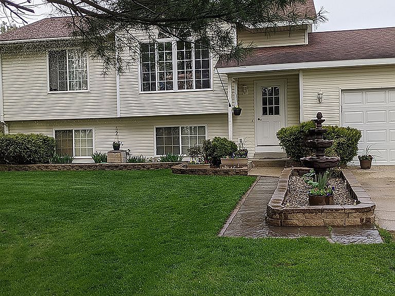 Front of home and yard