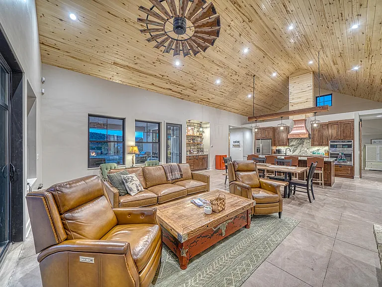 The view from all rooms are incredible. Check out that gorgeous windmill fan customized for the lodge. All on remote control for your seasonal adjustments.