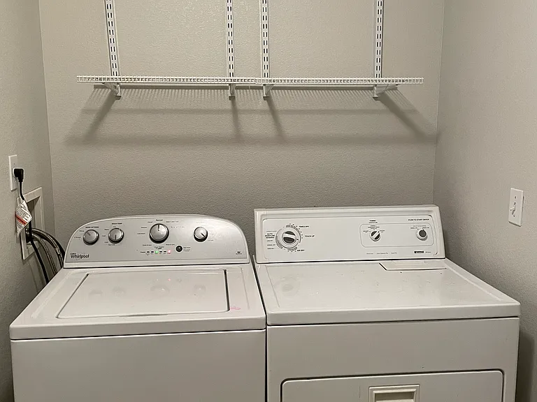 Included washer and dryer in separate laundry room