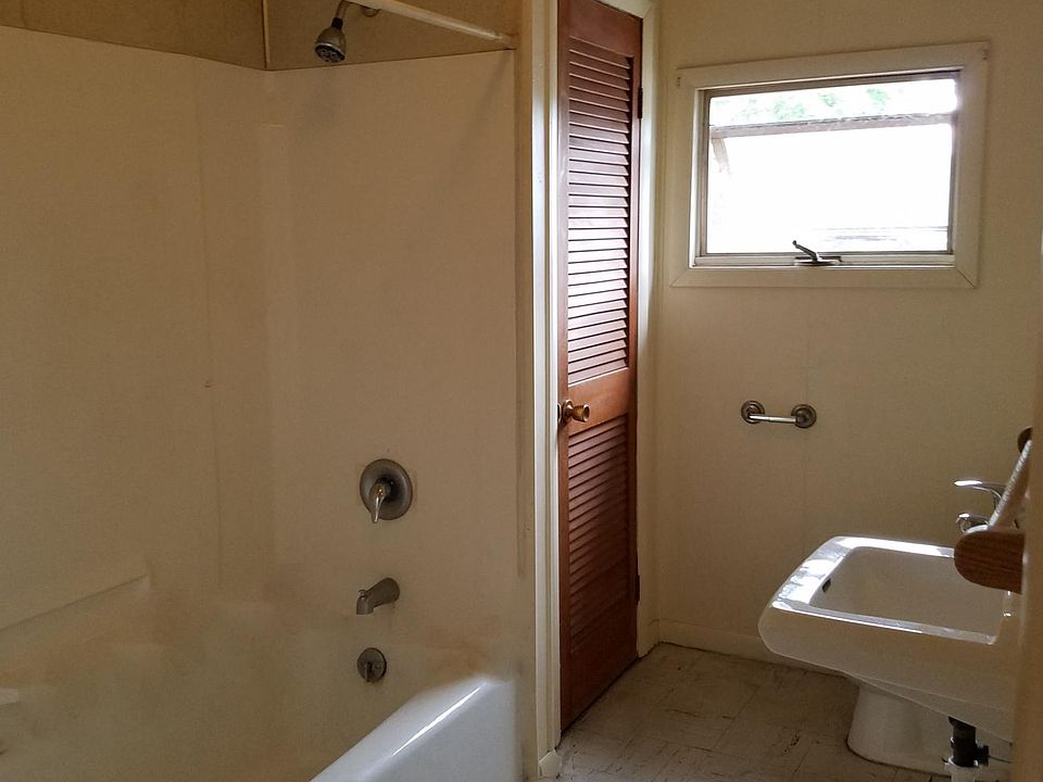 Shower and bath in large bathroom 