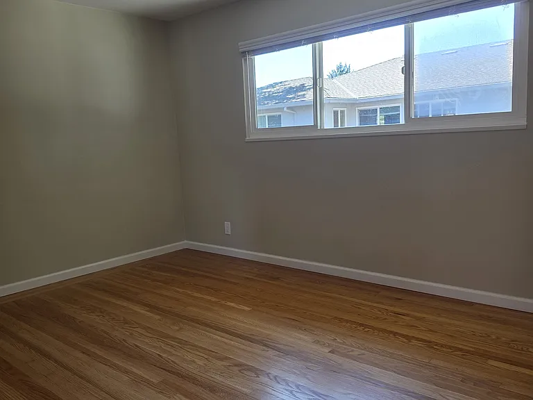 Large Bedroom, standing at door.