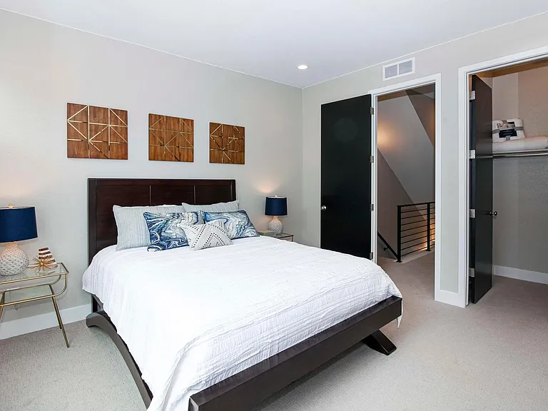 Master bedroom bedroom with walk-in closet