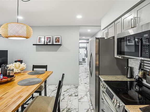 5th image of 416 73RD AVENUE N #207
