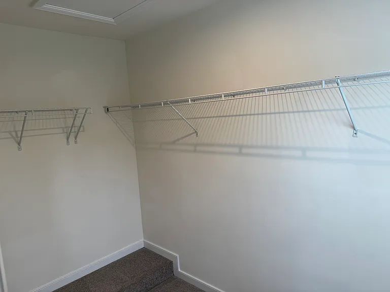 Primary Bedroom Walk-In Closet