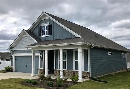 Covered front porch. Great location on a corner lot at the start of a small, quiet cul-de-sac.
