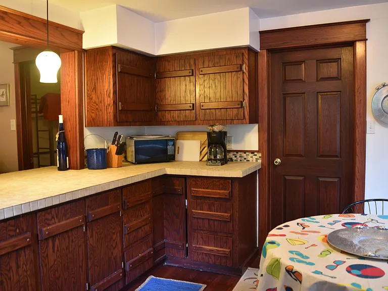 Kitchen with large peninsula and stools