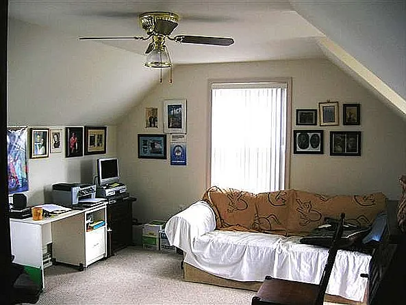 Sitting room (office) next to the master bedroom, over garage with 2 skylight windows, one large windows (in the view) and two front windows not showing in picture.