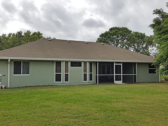 4th image of 5466 NW Model Court