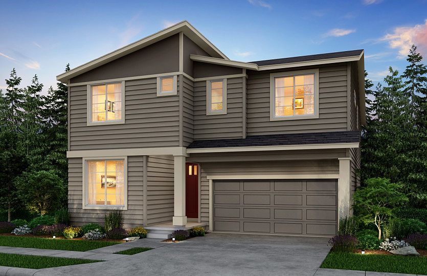 The Wellington, a single family, two-story home with a two-car garage shown in Exterior Home Design