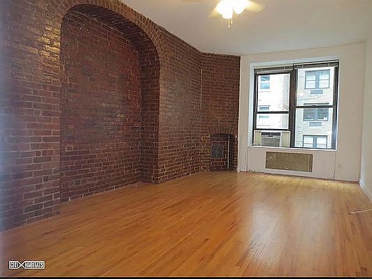 1st image of 117 W 58th St APT 3A