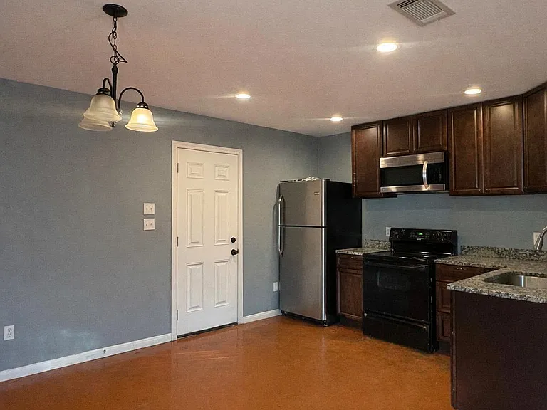 1403 Strickland St — Photo 3