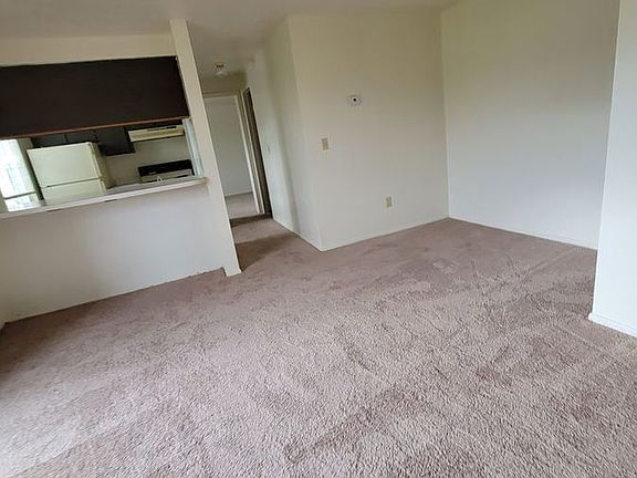 2nd image of 1448 W River Rd N APT E
