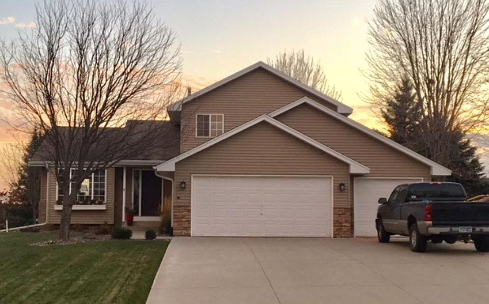 Immaculate move-in ready modified two story on Southside of Rogers.