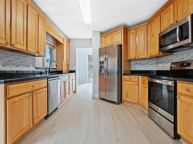 7685 NW 62nd Way — Photo 2