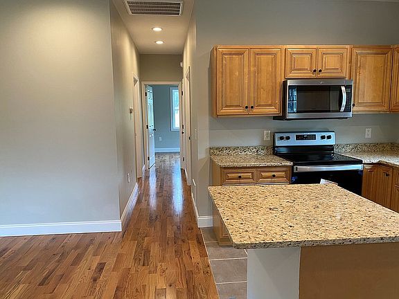 Hardwood flooring throughout
