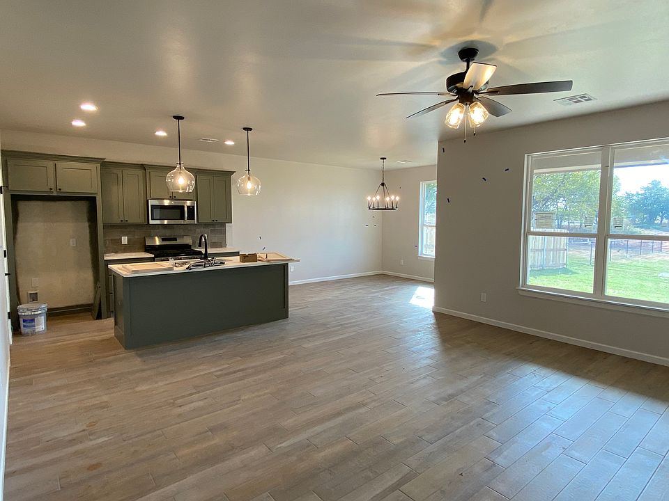 Living Room open to Kitchen and Dining