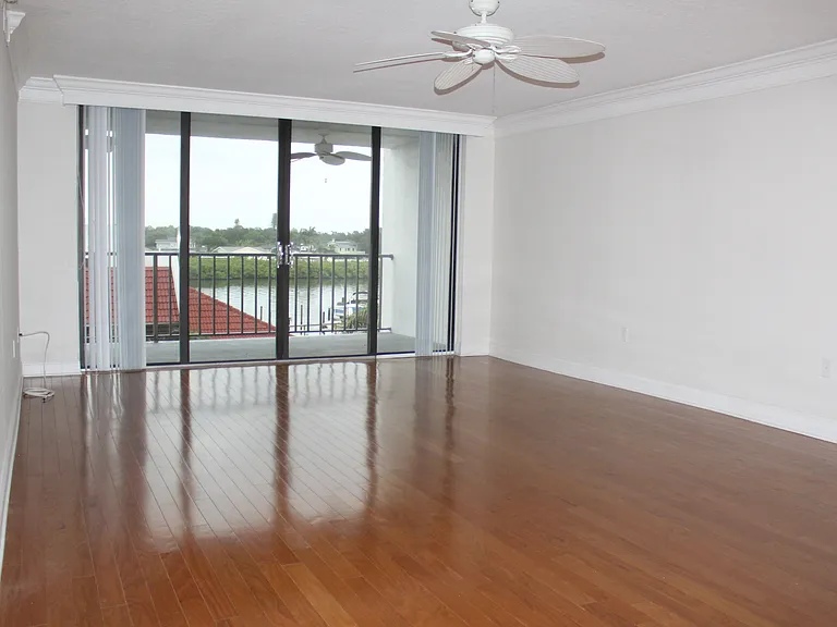 Living room opens to wall to wall sliding glass doors
