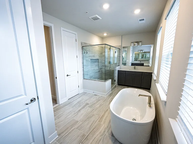 Primary Bathroom with Dual Vanities, Oversized Shower, and Soaker Tub