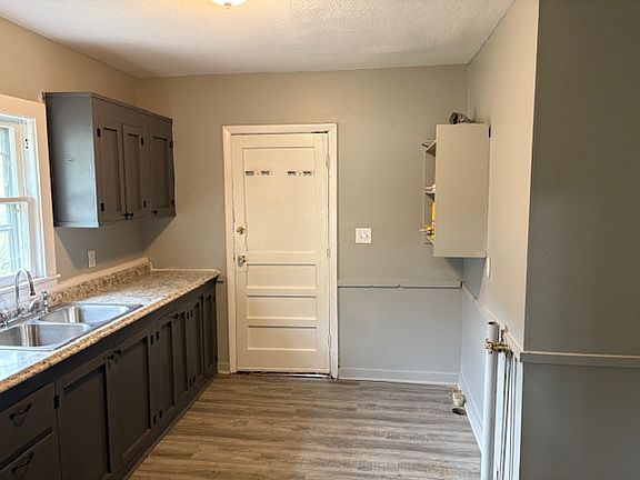 Kitchen - showing laundry hook-ups.