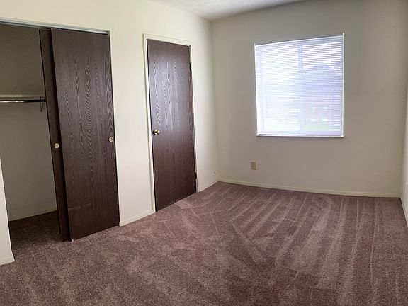 small bedroom across from hallway bathroom