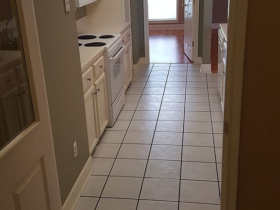 utility through kitchen to master bed