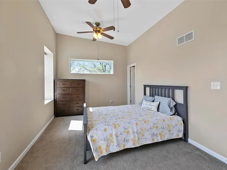 Master Bedroom + on suite. Note beautiful cathedral ceiling