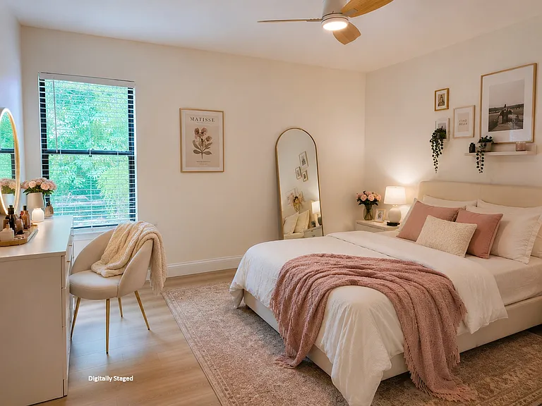Second bedroom with walk in closet and direct access to a bathroom. Digitally Staged
