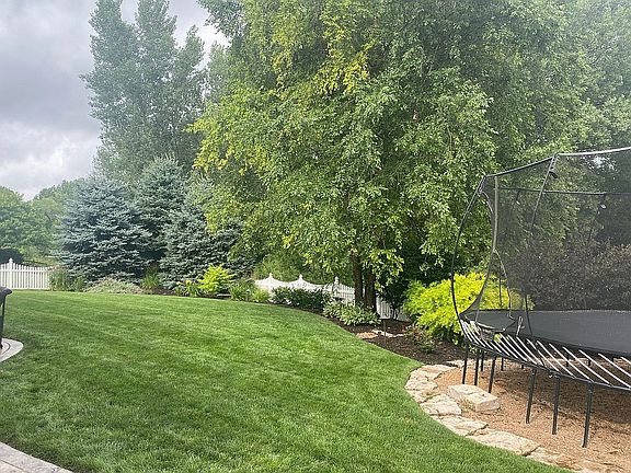 Backyard with vinyl fence 