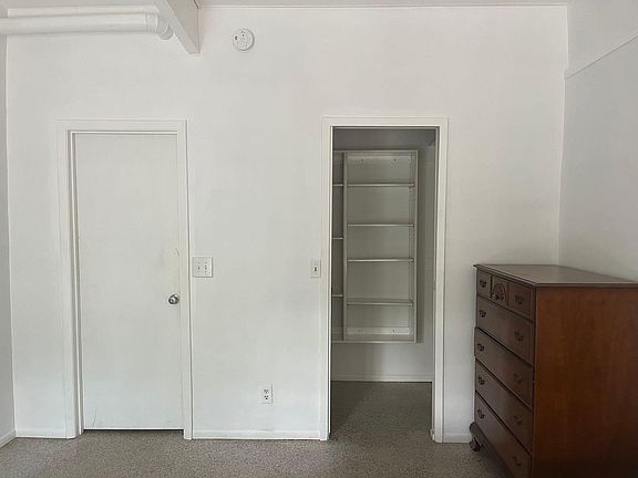 Hall door, closet, tall dresser