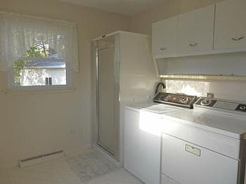 First floor utility room includes a shower
