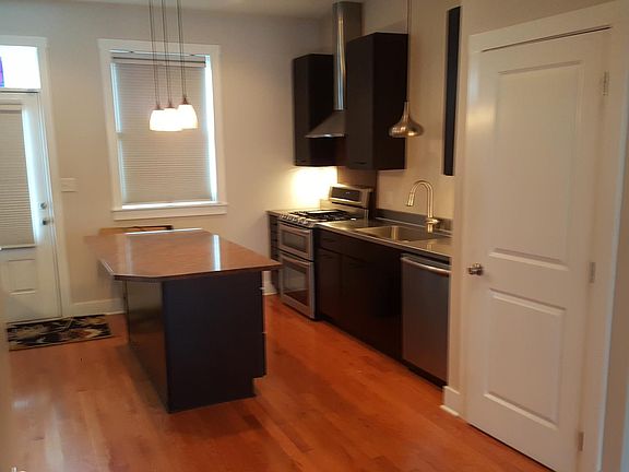 Stainless steel sink counter & appliances.