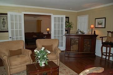 Living room with French doors to den