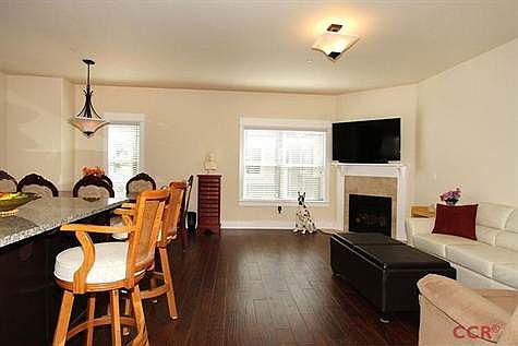 Your living room with a fire place to keep you cozy in the winter time or on a cold day! your dining