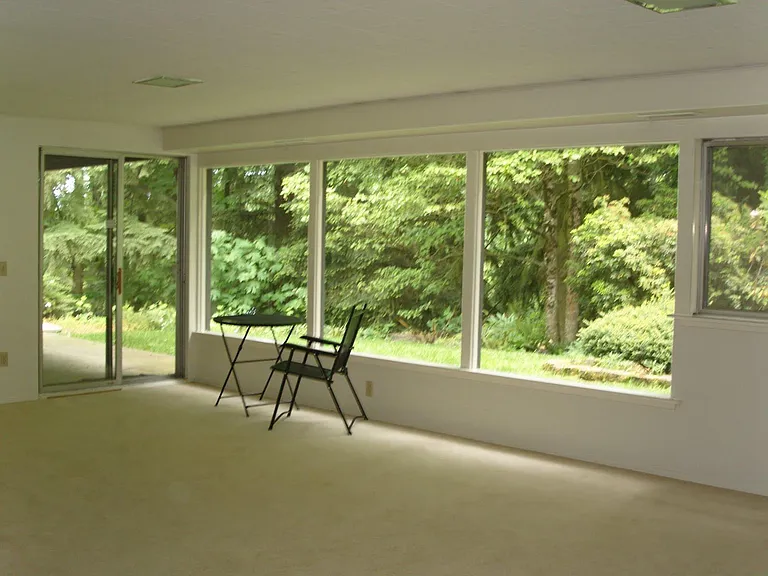 Downstairs family room with wood-burning fireplace