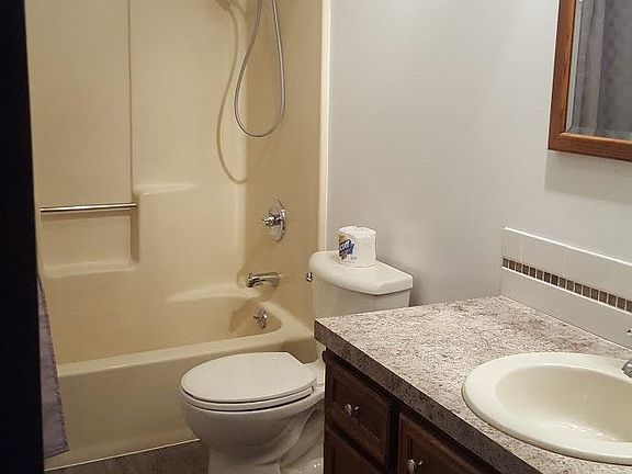 Bathroom with new toilet and updated fixtures