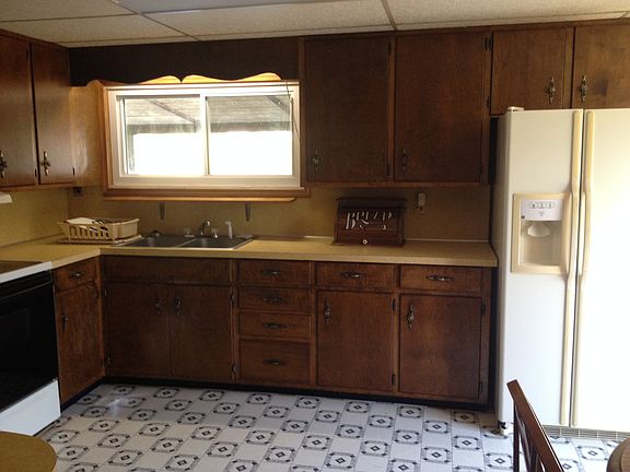 Range, fridge included