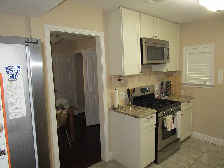 Kitchen with access straight to dining room.