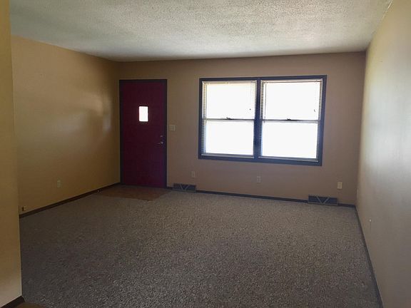 This is the front door and living room of the home.  