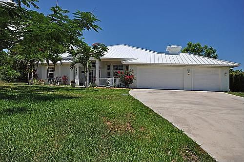3 car garage plus room for 5 more vehicles in the driveway!