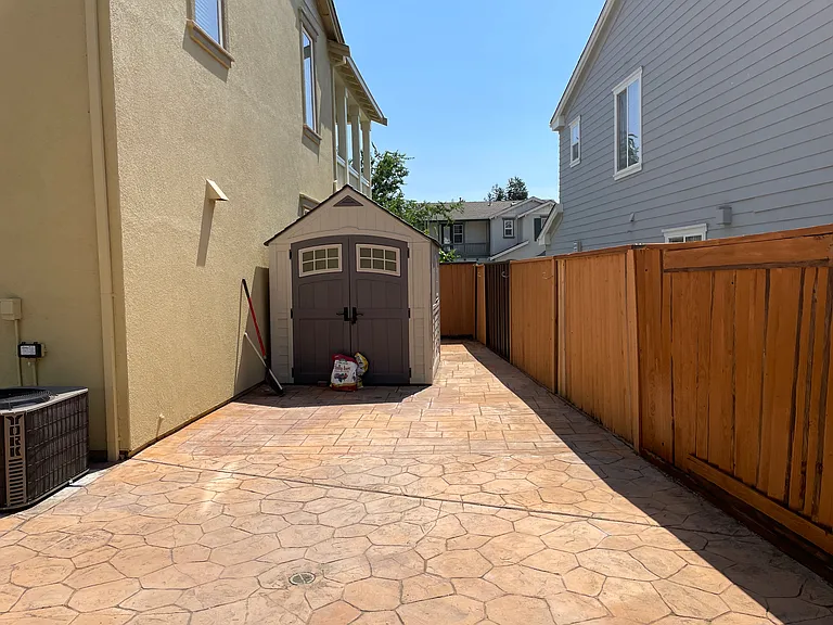 Right side yard with storage shed