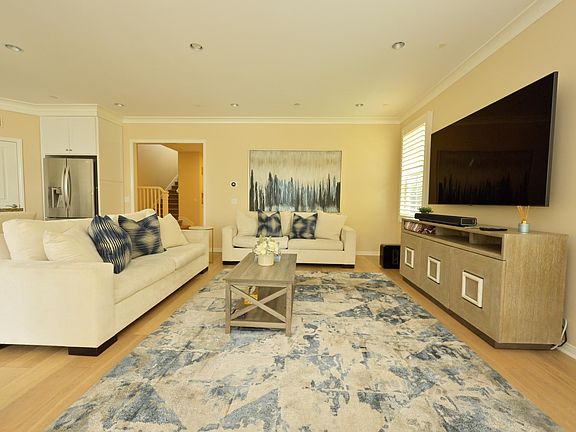 Living room includes 2 large comfy sofas.